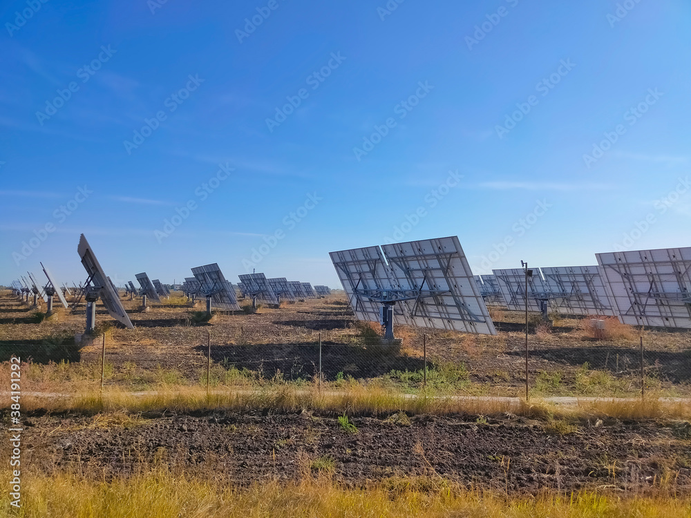 Garden Solar Panels with growing pumpkins. Use solar power, solar panels in your garden. Garden Solar Panels with growing pumpkins. Use solar power, solar panels in your garden.
