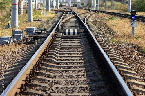 Railway rails stretching into the distance. The end of the Trans-Siberian Railway in Vladivostok.