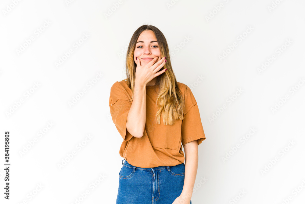 Young caucasian woman isolated on white background doubting between two options. Young caucasian woman isolated on white background doubting between two options.