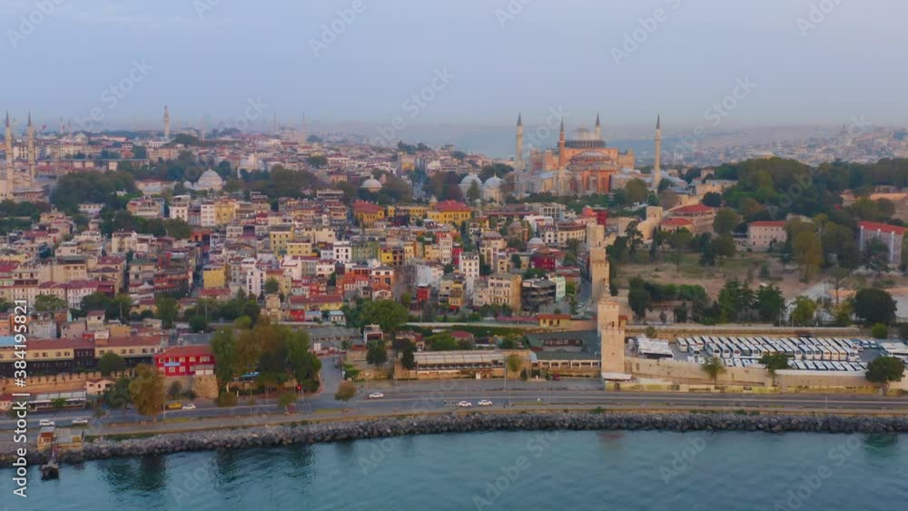 Istanbul, Turkey. Sultanahmet with the Blue Mosque, Hagia Sophia Grand Mosque (Ayasofya) and Topkapı museum with a Golden Horn bay on the background at sunset. Aerial view Istanbul, Turkey. Sultanahmet with the Blue Mosque, Hagia Sophia Grand Mosque (Ayasofya) and Topkapı museum with a Golden Horn bay on the background at sunset. Aerial view