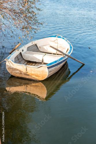 The rescue boat was moored to the shore of the pond. The concept of saving water © kpn1968