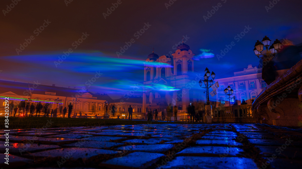 Northern lights reproduced from lasers and smoke in the center of Timisoara