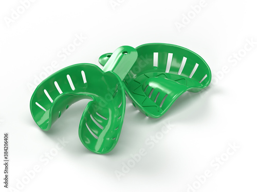 Fotografie Plastic green teeth impression trays orthodontic teeth straightening dentist