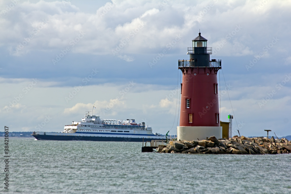 Ferry Passing Lighthouse