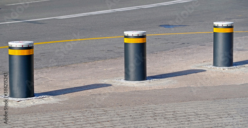 Retractable Electric Bollard Metallic, and hydraulic for the con photo