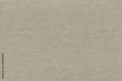Natural linen texture as backdrop. Abstract cotton towel mockup template fabric on background. Cloth wallpaper of artistic grey wale linen canvas texture for the painting. Cloth blanket or curtain.