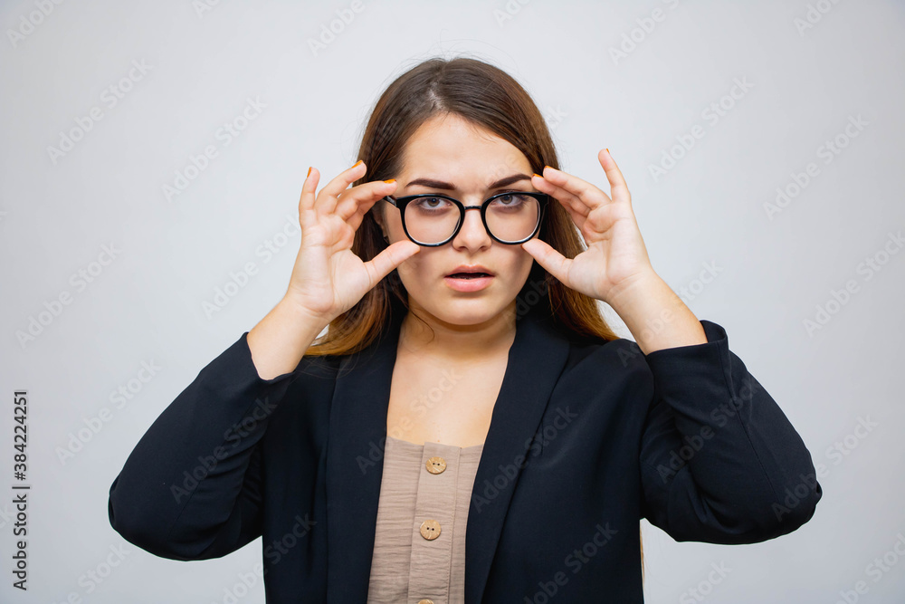 Woman on white background looking into the distance Woman on white background looking into the distance