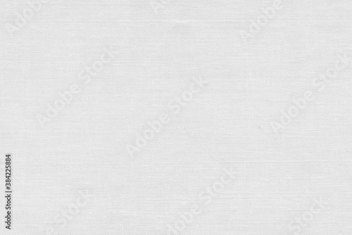 White natural linen texture as a backdrop. Abstract cotton towel mockup template fabric on the background. Cloth wallpaper of artistic grey wale linen canvas texture for the painting. 