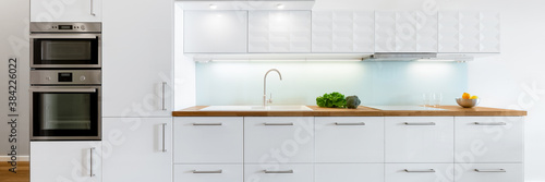 Modern white kitchen, panorama