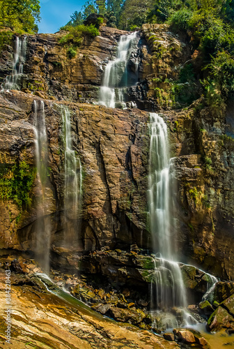 A long exposure shot of multiple waterfalls at Ramboda Falls in upland tea country in Sri Lanka, Asia
