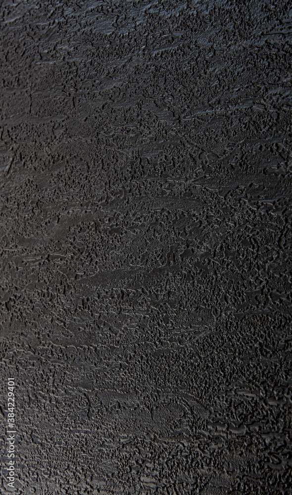 Fototapeta premium Black texture background. The dark embossed background.
