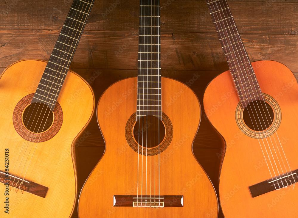 classical guitars in wooden background