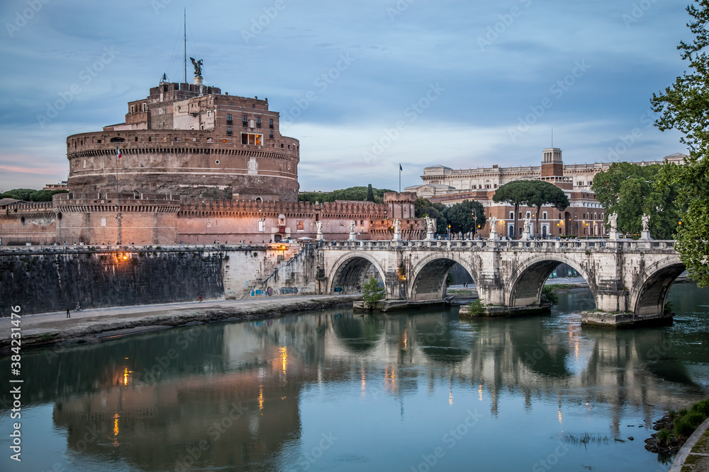 Castel Sant'angelo and the bridge of Sant'angelo across the Tiber in Rome on a may evening. Rome, Lazio, Italy Castel Sant'angelo and the bridge of Sant'angelo across the Tiber in Rome on a may evening. Rome, Lazio, Italy