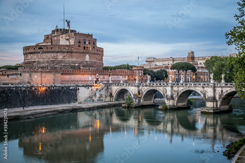 Photography Castel Sant'angelo and the bridge of Sant'angelo across the Tiber in Rome on a may evening