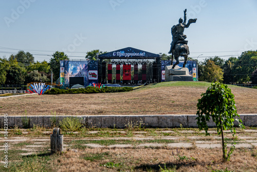 Tiraspol, Transdniester, 1 September 2017. Stage for anniversary celebrations placed behind a patriotic statue. photo