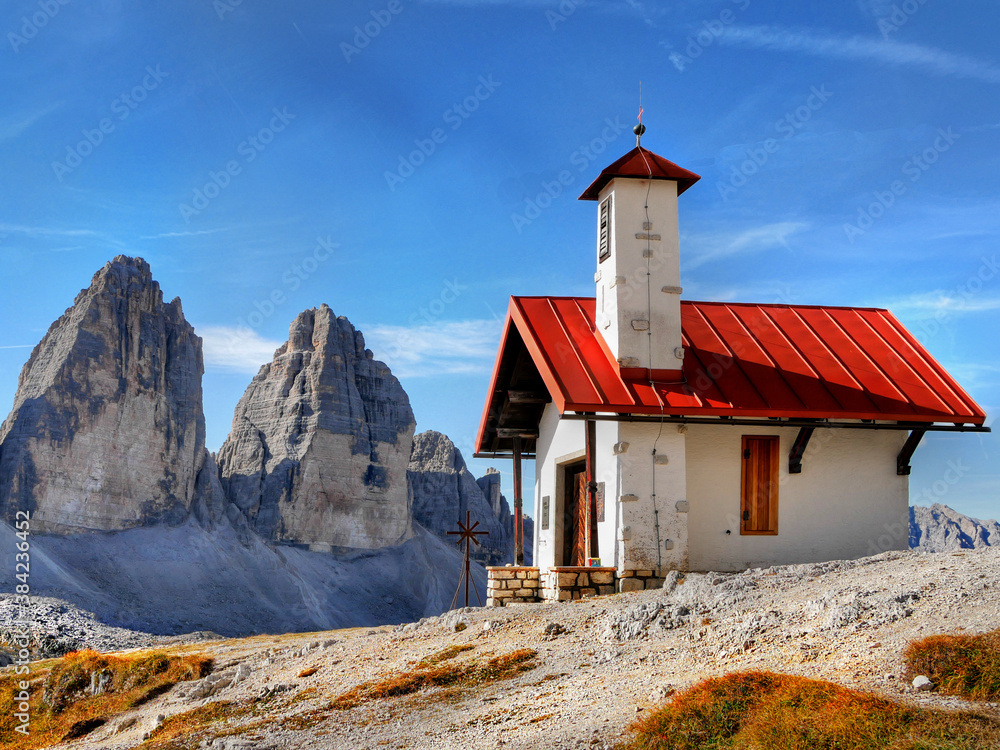 Christian chapel in the mountains Dolomites Italy