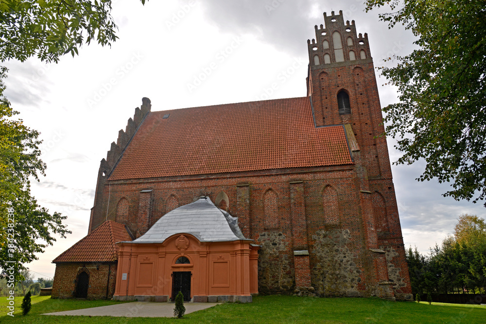 built at the end of the 14th century in the Gothic style, the Catholic Church of Our Lady of Victory in Łabędnik in Warmia and Masuria, Poland September 2020 general views and close-ups of architectur