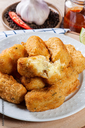 Konstfotografi .Codfish cake, very traditional in Portuguese cuisine. Made of cod and potato