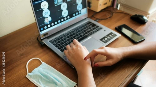 Young woman doing smart university lesson video call in covid-19 pandemic disease