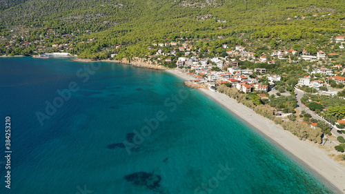 Aerial drone photo of beautiful seaside village and turquoise beach of Porto Germeno, Corinthian gulf, West Attica, Greece