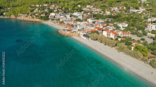 Aerial drone photo of beautiful seaside village and turquoise beach of Porto Germeno, Corinthian gulf, West Attica, Greece © aerial-drone