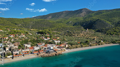 Aerial drone photo of beautiful seaside village and turquoise beach of Porto Germeno, Corinthian gulf, West Attica, Greece © aerial-drone