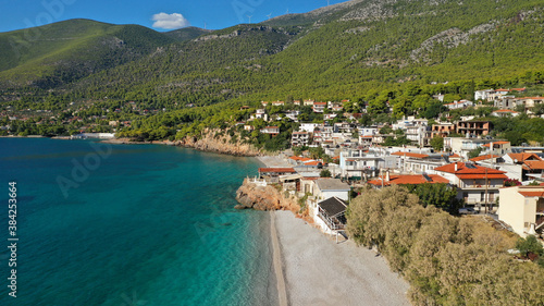 Aerial drone photo of beautiful seaside village and turquoise beach of Porto Germeno  Corinthian gulf  West Attica  Greece