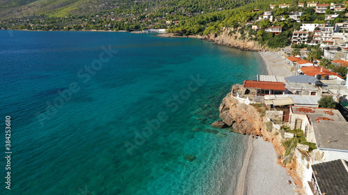 Fototapeta Naklejka Na Ścianę i Meble -  Aerial drone photo of beautiful seaside village and turquoise beach of Porto Germeno, Corinthian gulf, West Attica, Greece