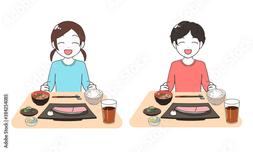 笑顔で食事を行う子供