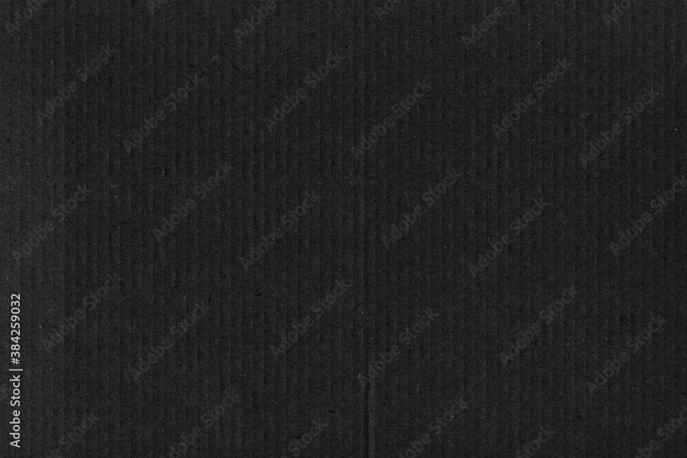 A black vintage rough sheet of carton. Recycled environmentally ...