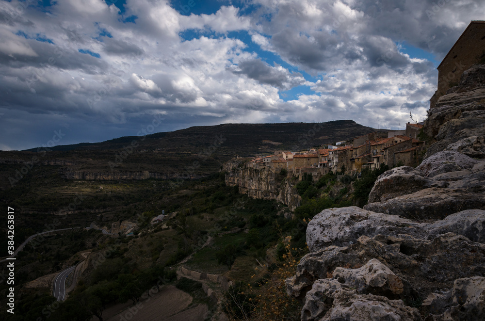 Naklejka premium Landscape of the medieval town of Cantavieja with the houses on the edge of the cliff. Teruel, Spain