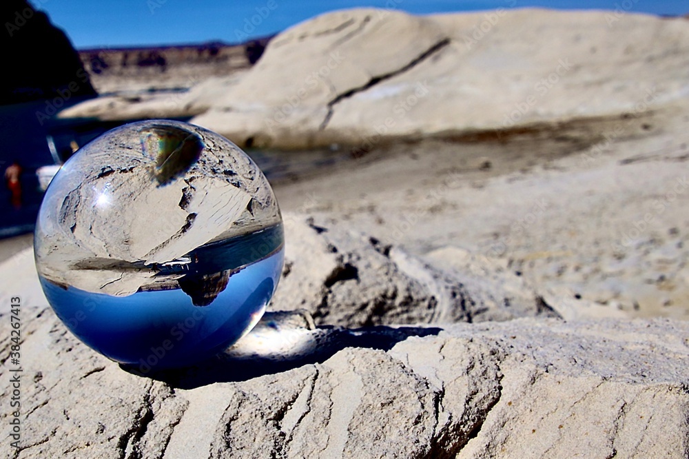 Obraz premium Earth on the beach, using a Lens ball