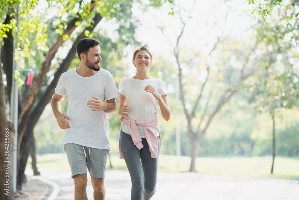 Fototapeta premium couple running in the park. 