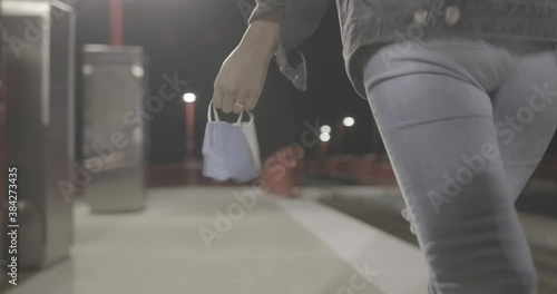 Walking with mask at side