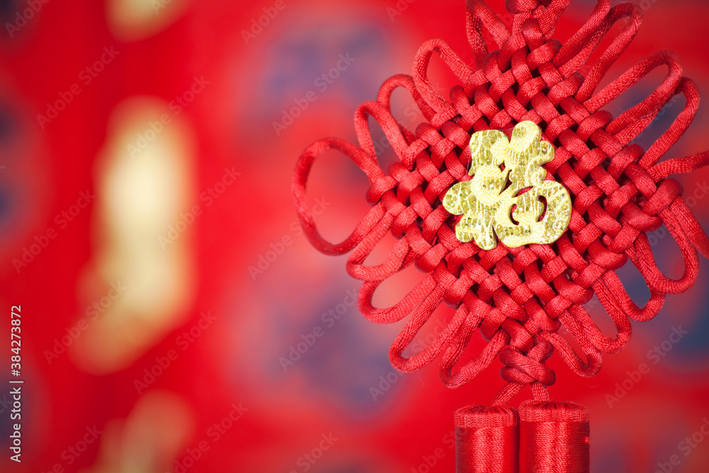 A red Chinese traditional ornament with Chinese knot A red Chinese traditional ornament with Chinese knot