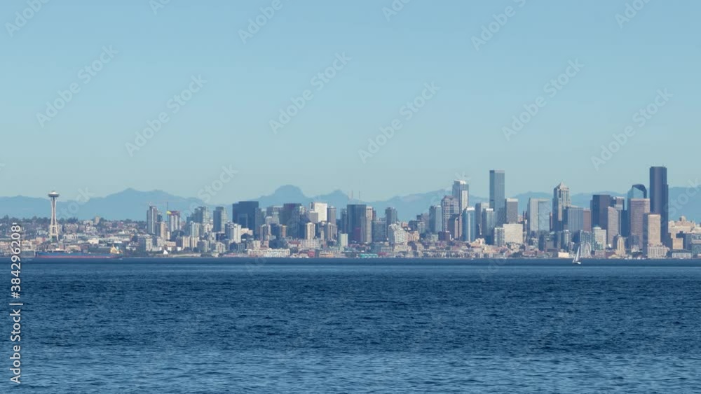 Downtown Seattle Washington Skyline Timelapse with Space Needle and Seattle Great Wheel seen from Bainbridge Island. Downtown Seattle Washington Skyline Timelapse with Space Needle and Seattle Great Wheel seen from Bainbridge Island.