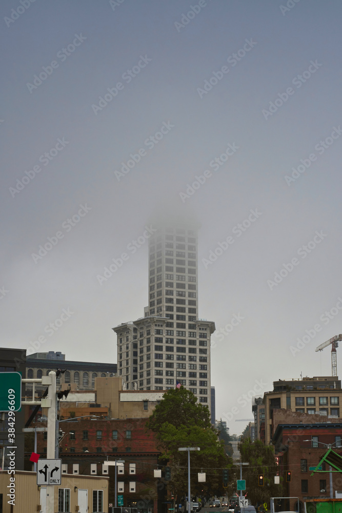 2020-10-08 VIEW OF PIONEER SQUARE FROM THE WATER FRONT WITH THE SKYLINE IN THE FOG