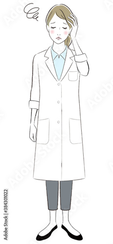 A doctor woman wearing lab coat having headache.