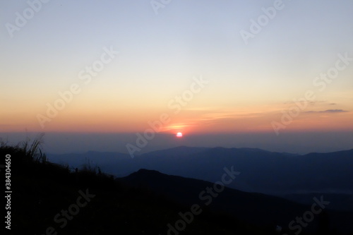 sunrise over the mountains © Meesakul_P
