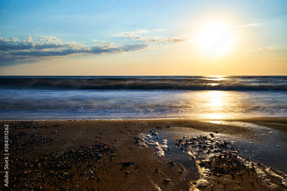 Sea sunset. Quiet calm sea. Sand beach. Sea sunset. Quiet calm sea. Sand beach.