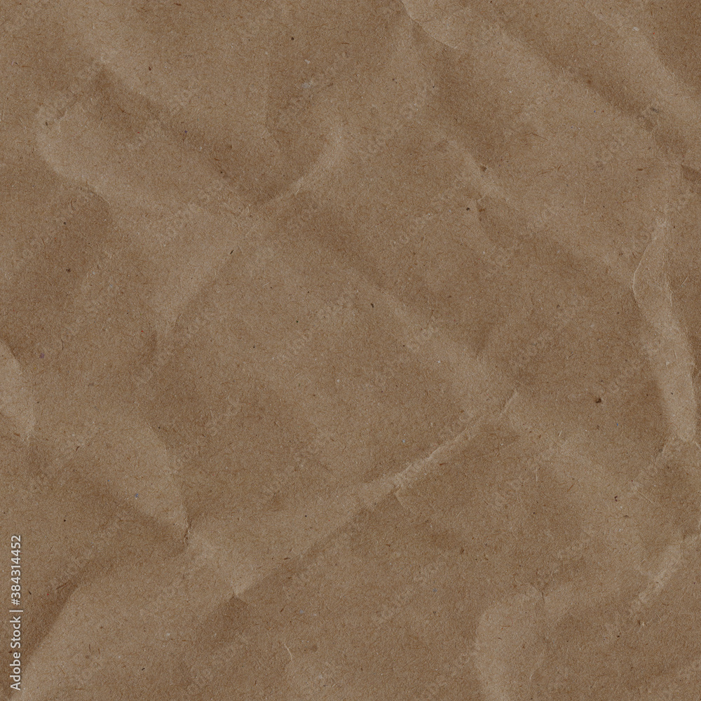 Fototapeta premium Classic vintage and old looking crumpled paper background. Retro cardboard texture. Grunge paper for drawing. Ancient book page. Present wrapping.