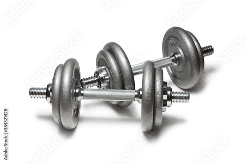 Metal dumbbells for fitness with chrome silver handle isolated on white
