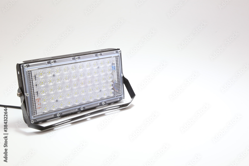 LED floodlight, outdoor light equipment. Isolated on white background. LED floodlight, outdoor light equipment. Isolated on white background.