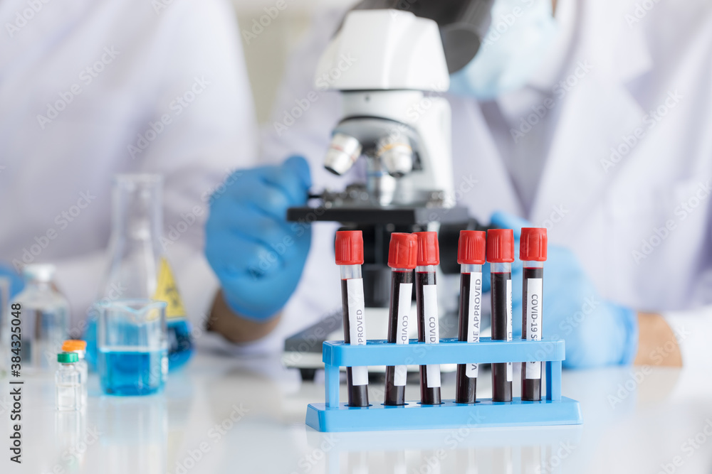 Exam blood in test tube on table in life science laboratory. Exam blood in test tube on table in life science laboratory.