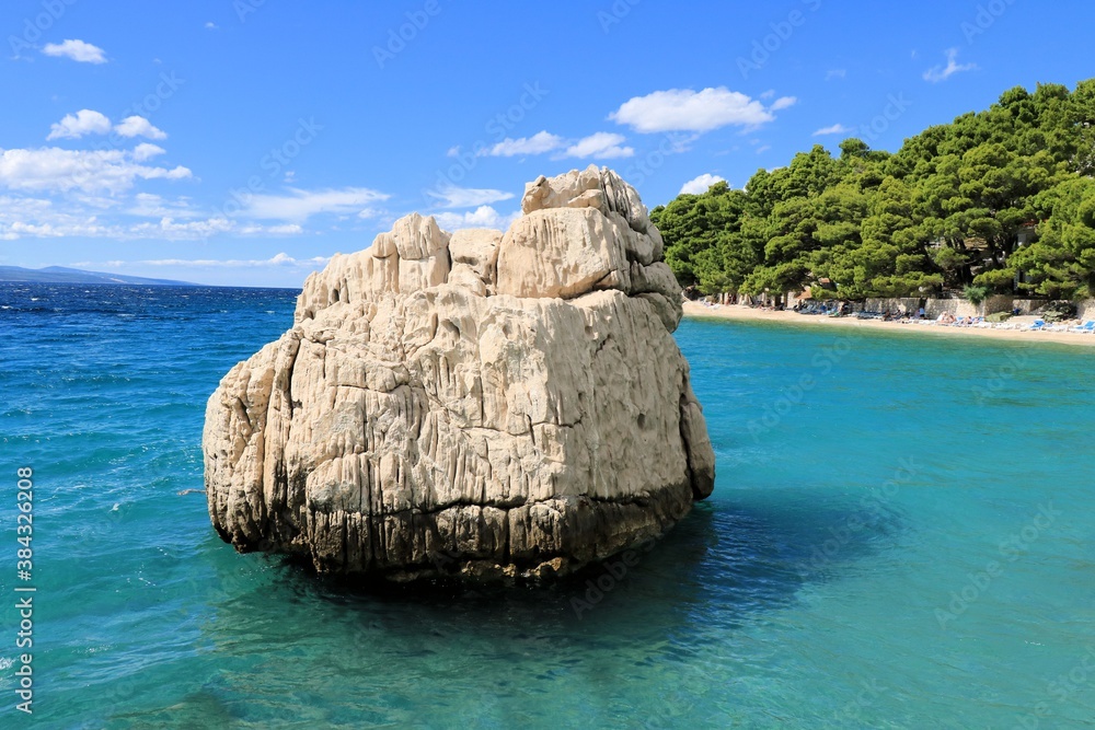 bold rock in the sea between Baska Voda and Brela, Croatia