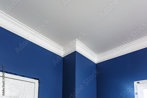 Obraz na płótnie Detail of corner ceiling with intricate crown molding.