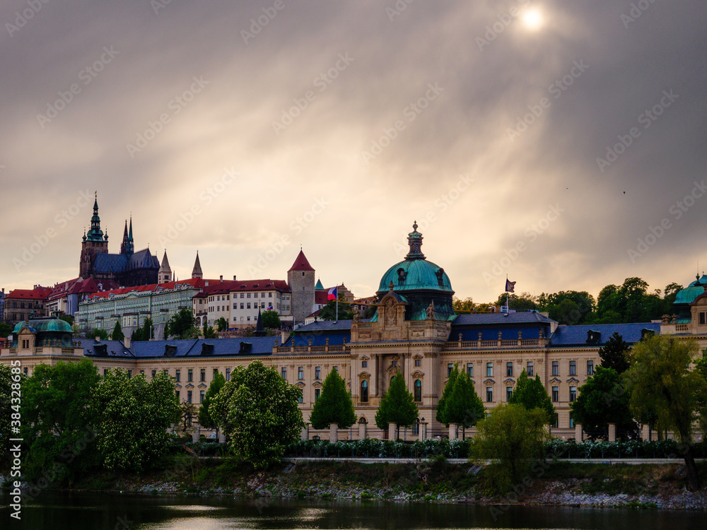 Naklejka premium Dramatic sunset sky over Prague Castle