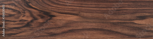 Texture of black walnut board with oil finish