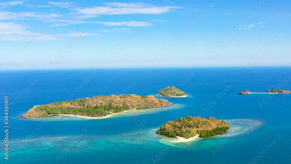 Tropical Islands with beautiful sandy beaches. Zamboanga Peninsula. Sallangan Islands, Simoadang Island. Mindanao, Philippines. Summer and travel vacation concept.
