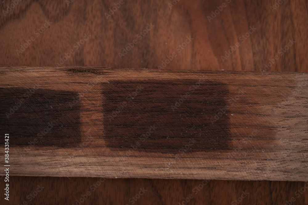 toning oil sample on walnut wood